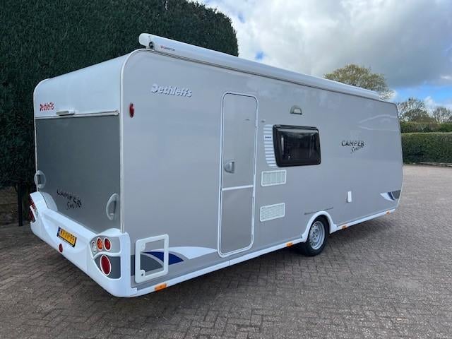Dethleffs Camper Snow 560 met luifel en Isabella voortent, Rondzit, Vast bed, 7 tot 8 meter, Luifel