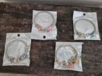 4 armbandjes met bedels, Ophalen of Verzenden, Zo goed als nieuw, Overige materialen
