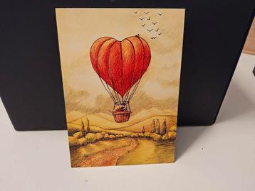 Ansichtkaart met luchtballon hart beschikbaar voor biedingen