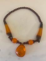 Vintage Amber Kleurige Ketting, Sieraden, Tassen en Uiterlijk, Kettingen, Met hanger, Kunststof, Bruin, Ophalen of Verzenden