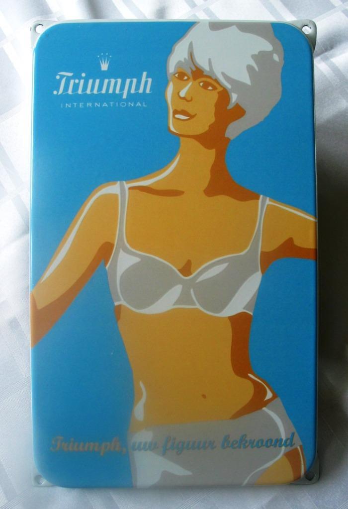 Triumph Emaille Reclame bord ! ( Triumph International ), Verzamelen, Merken en Reclamevoorwerpen, Zo goed als nieuw, Reclamebord