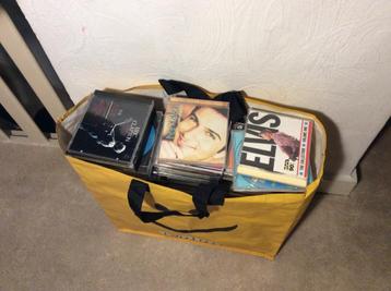 Tas vol CD,'s. Vanalles wat. in één koop beschikbaar voor biedingen