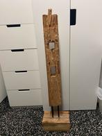 Hout ornament, Ophalen