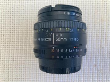 Nikon 50mm 1.8 AF-D + zonnekap HR-2 in box (als nieuw) beschikbaar voor biedingen