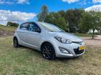 Hyundai i20 1.2 I 5-DRS 2014 Grijs, Auto's, Hyundai, Euro 5, Zwart, 4 cilinders, Handgeschakeld