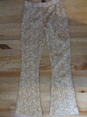 Bruin/witte broek maat 146-152 beschikbaar voor biedingen