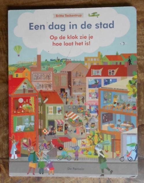 Karton-boek: Een dag in de stad - Op de klok zie je hoe laat, Boeken, Kinderboeken | Kleuters, Zo goed als nieuw, Ophalen of Verzenden