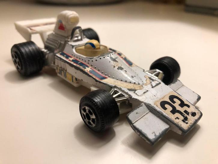 EVEL KNIEVEL Formula 5000 racewagen nr 33 - 1976 - Ideal, Hobby en Vrije tijd, Modelauto's | Overige schalen, Zo goed als nieuw
