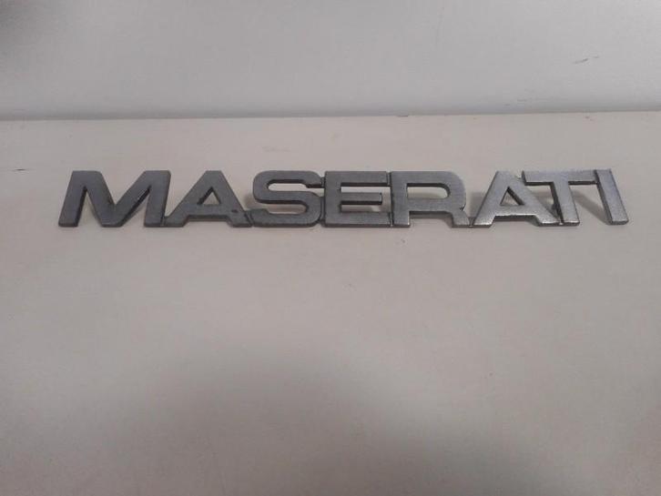 Embleem Maserati Biturbo (1985-07/1987-04), Auto-onderdelen, Carrosserie en Plaatwerk, Maserati, Gebruikt