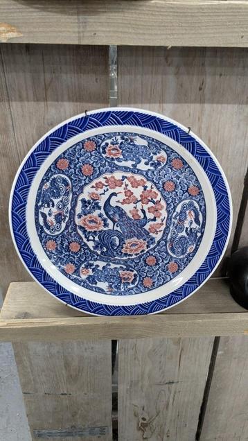 Chinees bord met draken en pauw beschikbaar voor biedingen