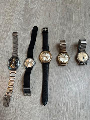 Vintage herenhorloges beschikbaar voor biedingen