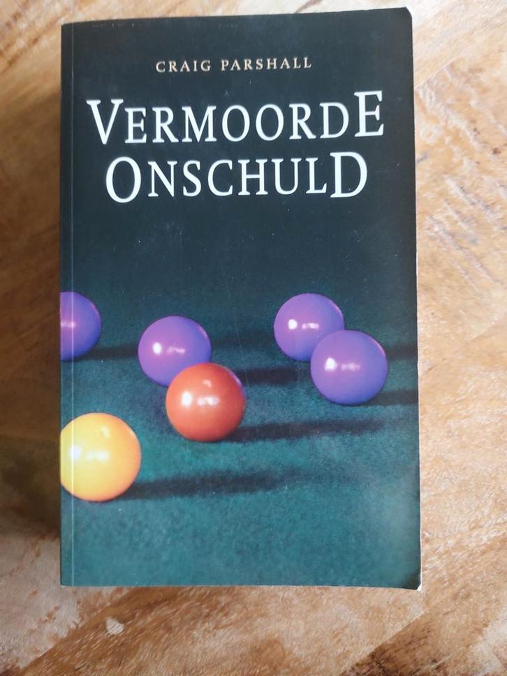 Vermoorde Onschuld - Craig Parshall, Boeken, Thrillers, Zo goed als nieuw, Nederland, Ophalen of Verzenden