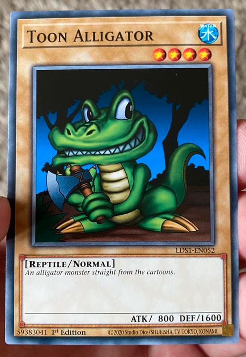 Yu-Gi-Oh! Toon Alligator LDS1 1st Edition !, Hobby en Vrije tijd, Verzamelkaartspellen | Yu-gi-Oh!, Zo goed als nieuw, Losse kaart