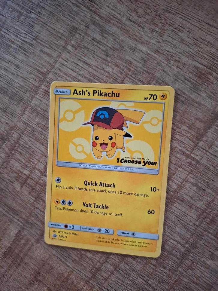 Ash's Pikachu Promo SM111. Ex-nm (in mijn ogen)???, Verzamelen, Overige Verzamelen, Gebruikt, Ophalen of Verzenden