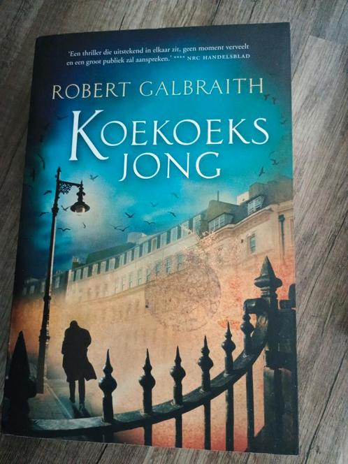 Robert Galbraith - Koekoeksjong, Boeken, Thrillers, Zo goed als nieuw, Nederland, Ophalen of Verzenden
