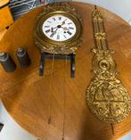 Antieke klok met emaille wijzerplaat, Ophalen