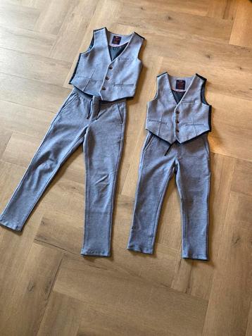 WE Feestkleding- 2 sets- lichtblauw- 110/116 en 134/140.  beschikbaar voor biedingen