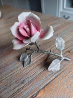 Antieke roos met tinnen tak, Ophalen