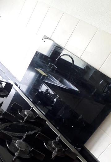 Spatscherm 70 x 40cm beschikbaar voor biedingen