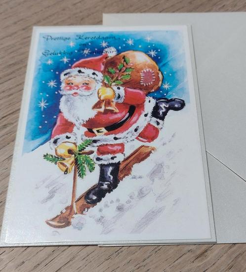 Kerst kaart kerstman op een sneeuw step. Incl. Envelop., Hobby en Vrije tijd, Kaarten | Zelfgemaakt, Zo goed als nieuw, Kerst