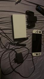 Nintendo Switch OLED met  Super Mario Bros. Wonder, Switch OLED, Met games, Ophalen of Verzenden, Zo goed als nieuw