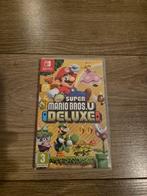 Super Mario Bros U Deluxe voor de Nintendo Switch, 3 spelers of meer, Ophalen of Verzenden, Gebruikt, Vanaf 3 jaar