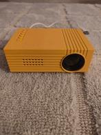 Mini beamer (geel/oranje), Ophalen of Verzenden, Zo goed als nieuw