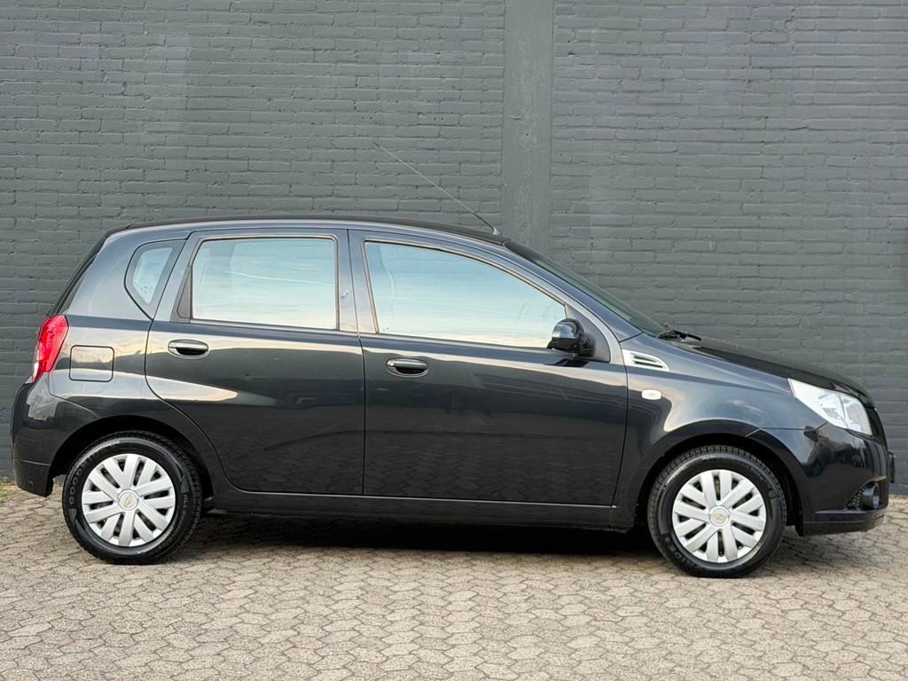 Chevrolet Aveo 1.4 16V LS AUTOMAAT AIRCO APK 5deurs, Aveo, 4 cilinders, 400 kg, Origineel Nederlands