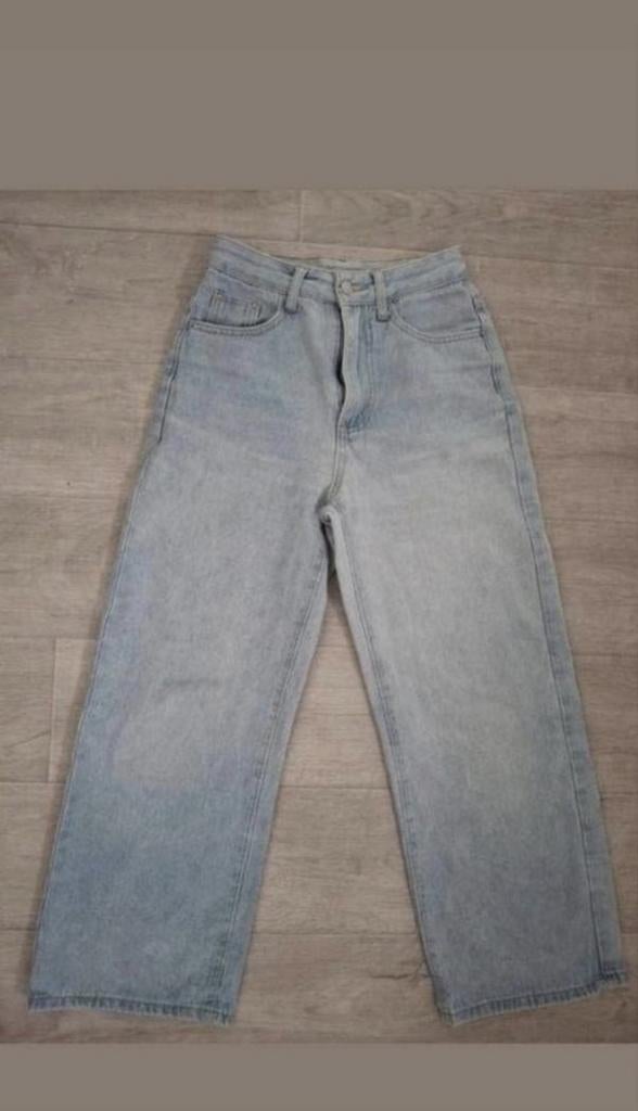 Spijkerbroek xxs lichtblauw wijde pijpen, Blauw, Ophalen of Verzenden, Zo goed als nieuw, Maat 34 (XS) of kleiner