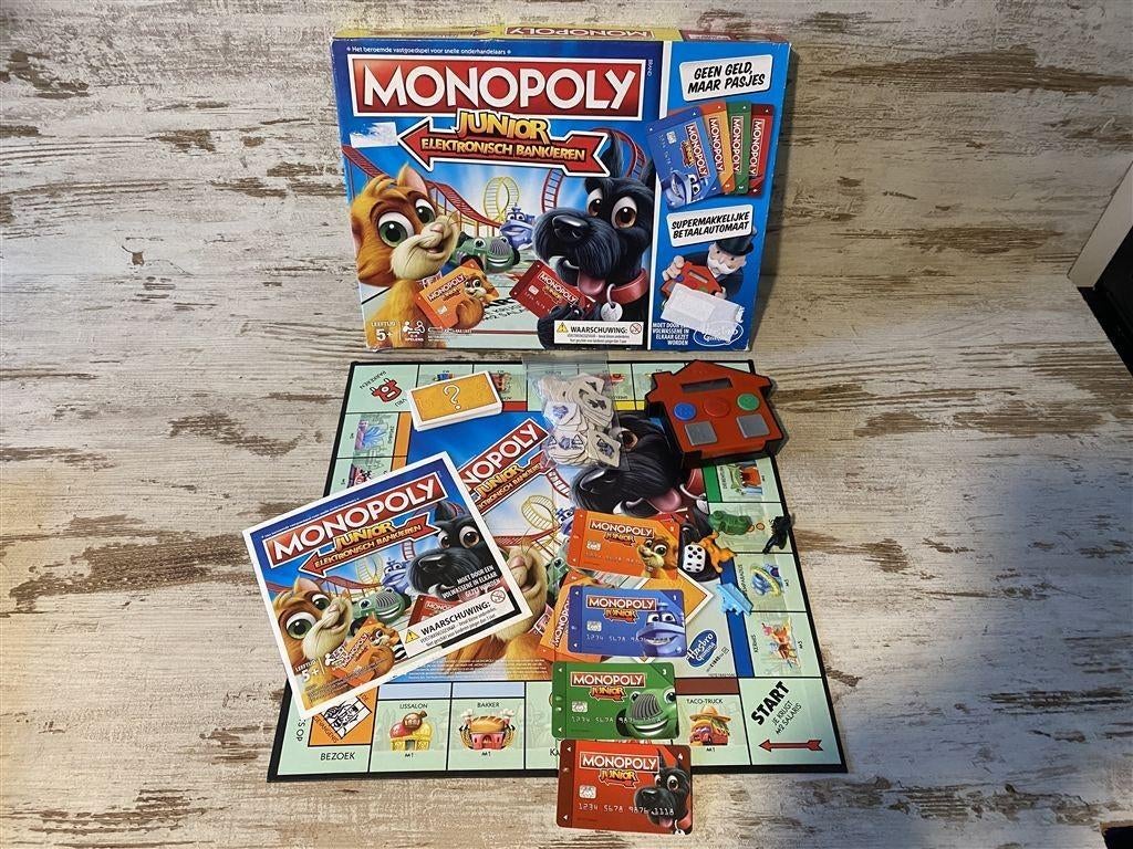 Monopoly junior elektronisch bankieren [s636], Hobby en Vrije tijd, Gezelschapsspellen | Bordspellen, Verzenden, Zo goed als nieuw