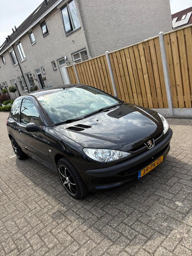 Peugeot 206 1.4 X-line 3D 2004 Zwart, Auto's, Voorwielaandrijving, 31 €/maand, 4 cilinders, Zwart