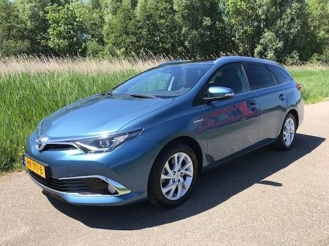 Toyota Auris 1.8 Hybrid Touring Sports CVT 2015 Blauw, Auto's, Toyota, 28 km/l, Euro 6, Blauw, Origineel Nederlands