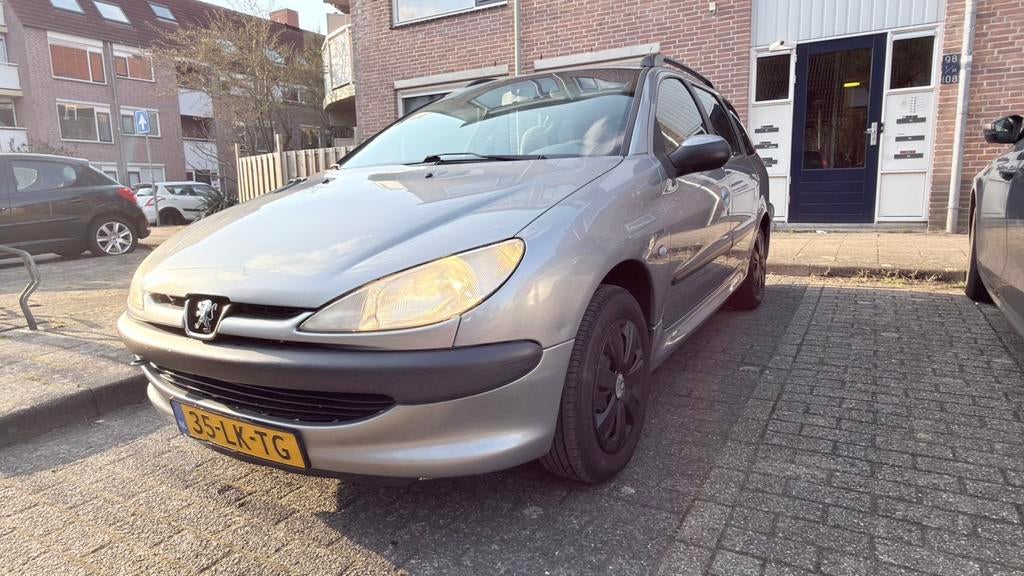 Peugeot 206 1.4 SW X-line 2003 Grijs, Voorwielaandrijving, Stof, 4 cilinders, Origineel Nederlands