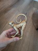 Beeldje gouden aapje, Ophalen