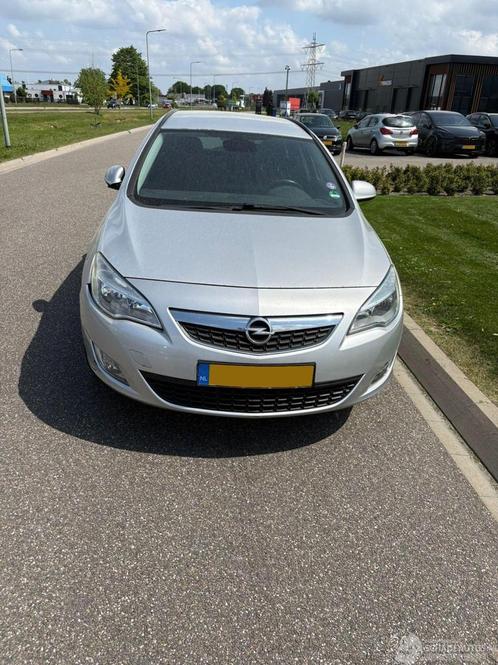 Opel Astra 1.4 TURBO SPORTS TOURER (bj 2012), Auto diversen, Schadeauto's, Handgeschakeld, Benzine, Stationwagon, Zilver of Grijs