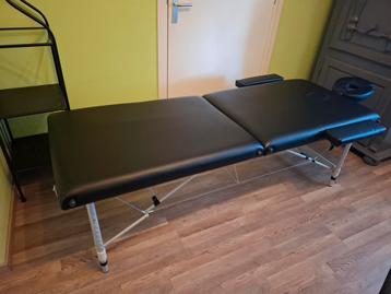 Inklapbare en in hoogte verstelbare massagebank beschikbaar voor biedingen