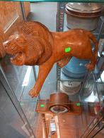 Houten Leeuw Sculptuur, Ophalen