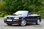 Audi Cabriolet 110 KW E2 (bj 1995, automaat), Auto's, Oldtimers, Automaat, Zwart, Blauw, Leder en Stof