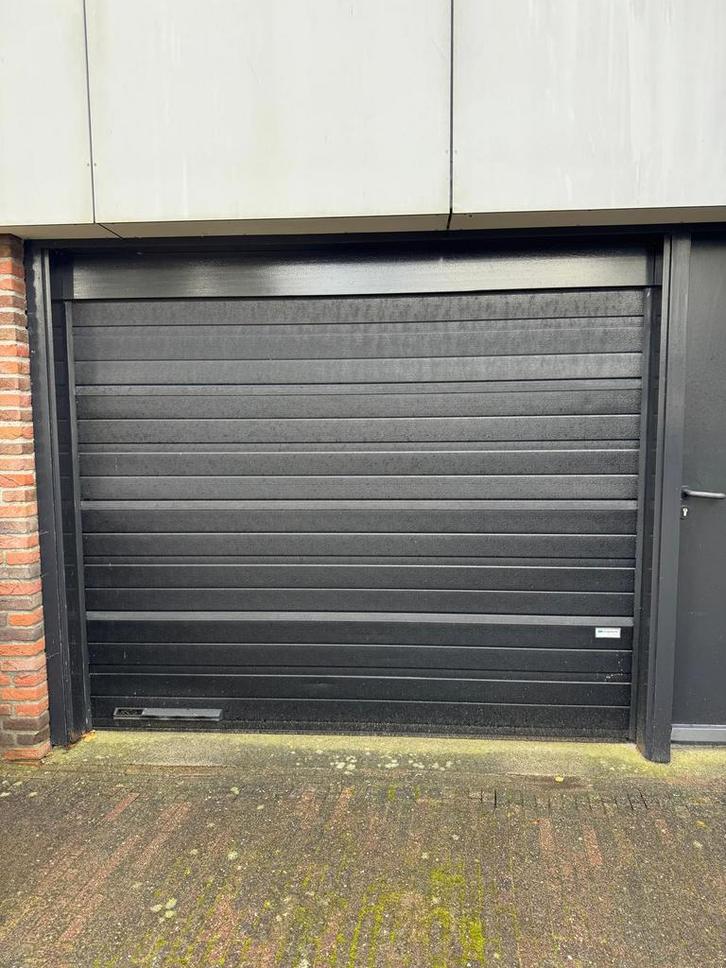 Sectionaaldeur Crawford elektrisch met motor geïsoleerd, Doe-het-zelf en Verbouw, Deuren en Horren, Gebruikt, Garagedeur, 215 cm of meer