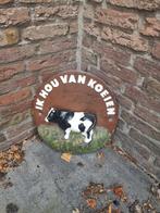 Wand decoratie van beton, Ophalen
