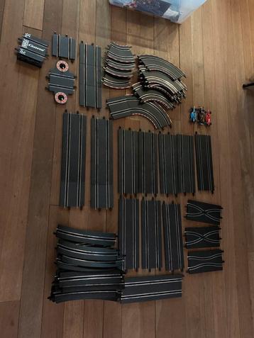 Racebaan Carrera Go met veel accessoires en 3 auto’s beschikbaar voor biedingen