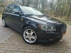 Volvo V50 2.4 D5 Geartronic 2006 Zwart, Auto's, Volvo, 1436 kg, 179 pk, Zwart, Stationwagon