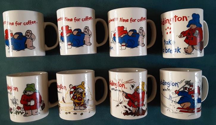 Set van 8 Paddington mokken o.a. lente,zomer,herfst,winter, Huis en Inrichting, Keuken | Servies, Zo goed als nieuw, Kop(pen) en/of Schotel(s)
