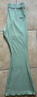 Nieuwe Nike tight fit high rise broek maat L, Maat 42/44 (L), Nike, Nieuw, Ophalen of Verzenden
