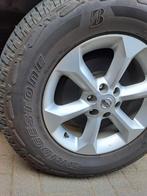 4 gebruikte banden Bridgestone Dueler all-terrain 255/65R17, Ophalen, Gebruikt, Nissan