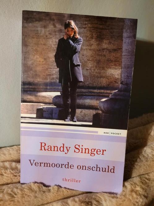 R. Singer - Vermoorde onschuld- pocketed, Boeken, Literatuur, Zo goed als nieuw, Nederland, Ophalen of Verzenden