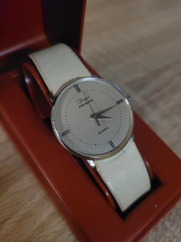 Design Prisma horloge (swiss made) beschikbaar voor biedingen
