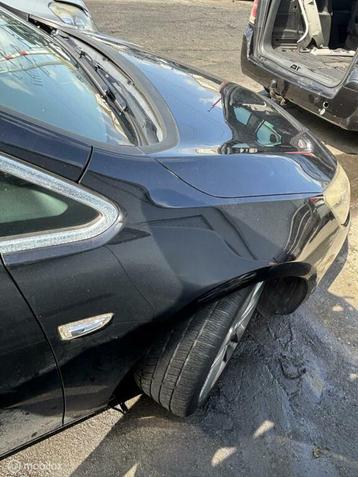 Voorscherm rechts zwart Opel Astra J ('09-'15) beschikbaar voor biedingen