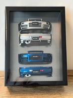 Nissan R34 Bumper Display Frame 1:18 Motorhelix blauw, Hobby en Vrije tijd, Modelauto's | 1:18, Ophalen of Verzenden, Nieuw, Auto
