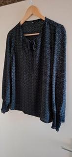 Zwarte blouse met print, Ophalen